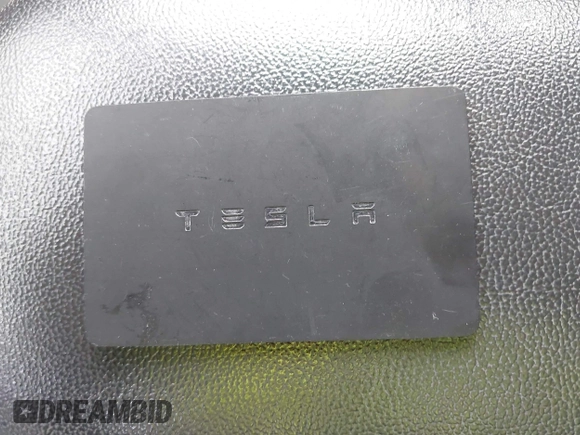 2018 Tesla Model 3 Long Range Battery with VIN 5YJ3E1EA8JF154738, listed as a IAAI auction lot 41013807 with 115,488 mi miles and . Bid and sale history available at DreamBid. Image 11.