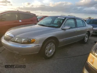 2000 Lincoln Continental with VIN 1LNHM97V3YY920453, listed as a Copart auction lot 76306424 with 117,912 mi miles and Non Repairable. Bid and sale history available at carsss.com. Image 1.