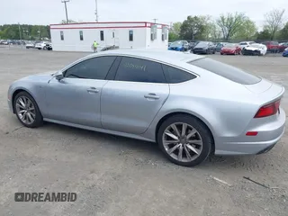 2016 Audi A7 Prestige z VIN WAU2GAFC6GN007637, wystawiony jako IAAI lot #42084141 z przebiegiem 131 213 mil mil oraz . Historia ofert i sprzedaży dostępna na DreamBid. Obrazek 14.