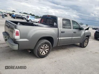 2008 Mitsubishi Raider LS z VIN 1Z7HC28K98S619809, wystawiony jako Copart lot #74547364 z przebiegiem 122 835 mil mil oraz Szkoda całkowita • Salvage title. Historia ofert i sprzedaży dostępna na DreamBid. Obrazek 3.