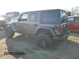2021 Jeep Wrangler Unlimited Rubicon with VIN 1C4JJXFG8MW869995, listed as a Copart auction lot 83472254 with 48,302 mi miles and Salvage Title. Bid and sale history available at carsss.com. Image 2.