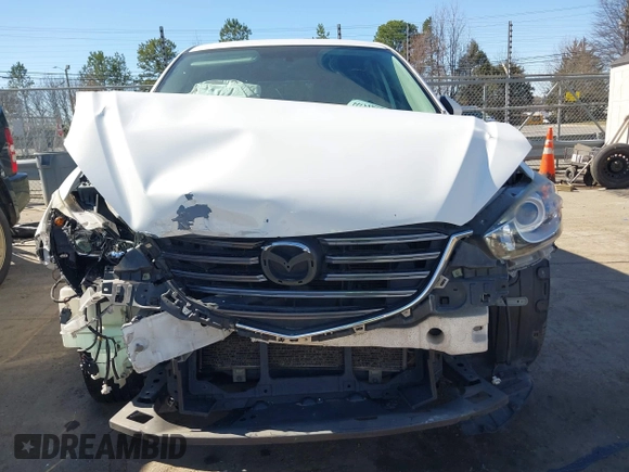 2016 Mazda CX-5 Sport with VIN JM3KE2BY9G0890587, listed as a IAAI auction lot 41685344 with 91,190 mi miles. Bid and sale history available at carsss.com. Image 12.