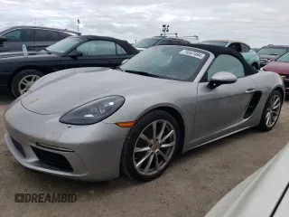 2017 Porsche 718 Boxster z VIN WP0CA2A81HS220788, wystawiony jako Copart lot #74547494 z przebiegiem Nie podano mil oraz Szkody całkowita. Historia ofert i sprzedaży dostępna na DreamBid. Obrazek 1.