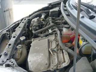 2015 Toyota Prius One z VIN JTDKDTB3XF1097121, wystawiony jako IAAI lot #42272691 z przebiegiem 124 485 mil mil oraz . Historia ofert i sprzedaży dostępna na DreamBid. Obrazek 19.