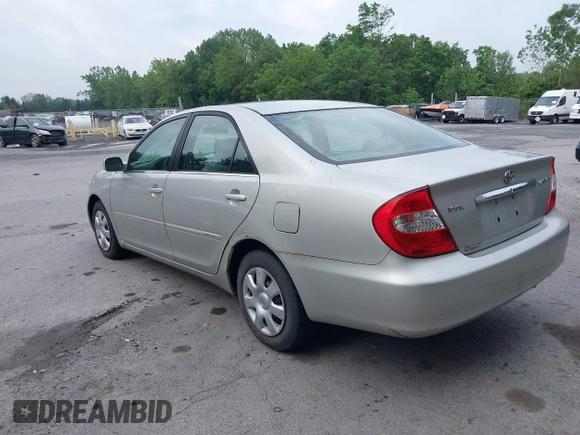 2004 Toyota Camry LE with VIN 4T1BE32K14U857478, listed as a IAAI auction lot 42654878 with 210,542 mi miles and . Bid and sale history available at DreamBid. Image 3.