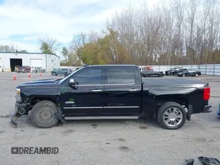 2016 Chevrolet Silverado 1500 High Country with VIN 3GCUKTEC2GG344953, listed as a IAAI auction lot 40700121 with 107,623 mi miles and . Bid and sale history available at DreamBid. Image 14.