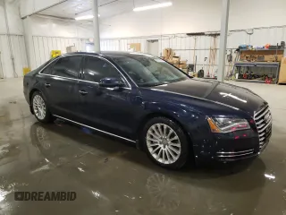 2014 Audi A8 4.0T with VIN WAUR2AFD8EN006198, listed as a Copart auction lot 85272544 with 105,058 mi miles and Salvage Title. Bid and sale history available at DreamBid. Image 4.