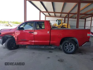 2015 Toyota Tundra SR with VIN 5TFRM5F11FX094947, listed as a IAAI auction lot 42066685 with 59,644 mi miles and . Bid and sale history available at DreamBid. Image 13.