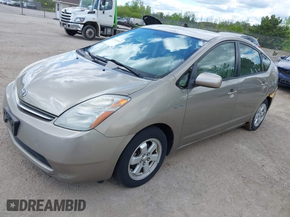 2007 Toyota Prius z VIN JTDKB20U573212497, wystawiony jako IAAI lot #42337219 z przebiegiem 198 984 mil mil oraz . Historia ofert i sprzedaży dostępna na DreamBid. Obrazek 2.