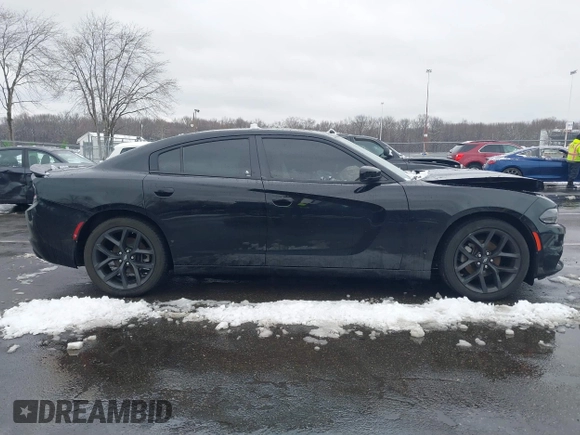 2022 Dodge Charger SXT with VIN 2C3CDXBG0NH157720, listed as a IAAI auction lot 41559731 with 21,062 mi miles and . Bid and sale history available at carsss.com. Image 13.