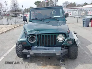 2000 Jeep Wrangler SE with VIN 1J4FA29P0YP728370, listed as a IAAI auction lot 41788463 with 186,995 mi miles. Bid and sale history available at carsss.com. Image 12.