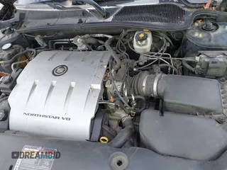 2004 Cadillac DeVille DHS z VIN 1G6KE54Y64U110060, wystawiony jako IAAI lot #42133610 z przebiegiem 68 677 mil mil oraz . Historia ofert i sprzedaży dostępna na DreamBid. Obrazek 10.