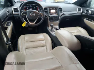 2016 Jeep Grand Cherokee Limited 75th Anniversary with VIN 1C4RJFBGXGC482082, listed as a Copart auction lot 56217165 with 80,787 mi miles and Salvage Title. Bid and sale history available at DreamBid. Image 8.