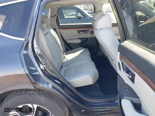 2019 Honda CR-V Touring with VIN 2HKRW1H96KH505447, listed as a IAAI auction lot 41876110 with 56,104 mi miles. Bid and sale history available at carsss.com. Image 8.