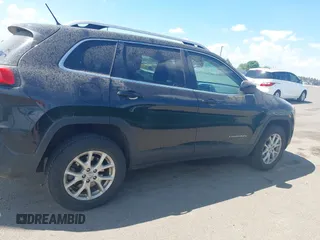 2015 Jeep Cherokee Latitude with VIN 1C4PJMCS3FW545440, listed as a IAAI auction lot 42268676 with 197,192 mi miles and . Bid and sale history available at DreamBid. Image 13.