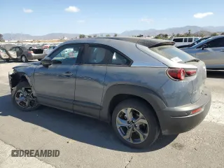 2022 Mazda MX-30 Premium Plus Package with VIN JM1DRADB1N0100639, listed as a Copart auction lot 71770904 with 23,452 mi miles and Salvage Title. Bid and sale history available at carsss.com. Image 2.