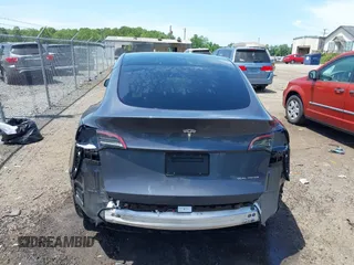 2023 Tesla Model Y Long Range with VIN 7SAYGAEE7PF615751, listed as a IAAI auction lot 42297819 with 31,201 mi miles and . Bid and sale history available at DreamBid. Image 17.