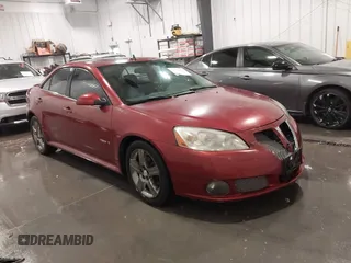 2009 Pontiac G6 GXP 1SA with VIN 1G2ZM577X94157511, listed as a IAAI auction lot 42296880 with 143,960 mi miles and . Bid and sale history available at DreamBid. Image 1.