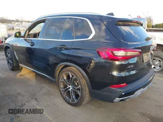 2021 BMW X5 xDrive40i with VIN 5UXCR6C08M9D76272, listed as a IAAI auction lot 41219782 with 56,599 mi miles and . Bid and sale history available at DreamBid. Image 3.