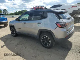 2021 Jeep Compass Trailhawk with VIN 3C4NJDDB5MT571837, listed as a Copart auction lot 58865625 with 75,456 mi miles and Salvage title. Bid and sale history available at DreamBid. Image 2.