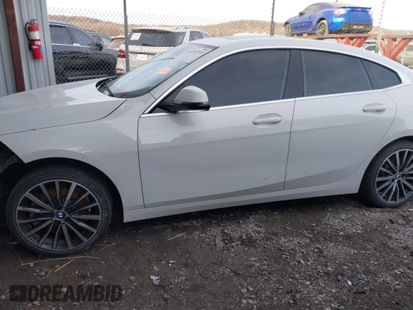 2021 BMW 2 Series 228i xDrive with VIN WBA73AK07M7H56978, listed as a IAAI auction lot 41215710 with 77,965 mi miles and . Bid and sale history available at DreamBid. Image 14.