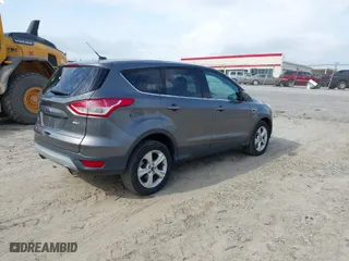 2014 Ford Escape SE with VIN 1FMCU9G97EUA06612, listed as a IAAI auction lot 41956359 with 161,126 mi miles. Bid and sale history available at carsss.com. Image 4.