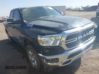 2022 Ram 1500 Big Horn z VIN 1C6RRFBG9NN279573, wystawiony jako IAAI lot #41692350 z przebiegiem 48 587 mil mil oraz . Historia ofert i sprzedaży dostępna na DreamBid. Obrazek 1.