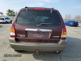 2002 Mazda Tribute LX with VIN 4F2CU08172KM34759, listed as a Copart auction lot 81631974 with 254,286 mi miles and Salvage Title. Bid and sale history available at carsss.com. Image 6.