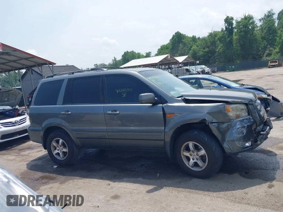 2007 Honda Pilot EX-L z VIN 5FNYF18517B001550, wystawiony jako IAAI lot #42263555 z przebiegiem 246 317 mil mil oraz . Historia ofert i sprzedaży dostępna na DreamBid. Obrazek 13.