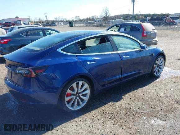 2018 Tesla Model 3 Long Range Battery z VIN 5YJ3E1EB5JF180030, wystawiony jako IAAI lot #41897617 z przebiegiem 89 557 mil mil oraz . Historia ofert i sprzedaży dostępna na DreamBid. Obrazek 4.