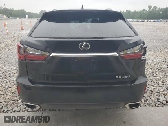 2016 Lexus RX 350 z VIN 2T2BZMCA5GC009119, wystawiony jako Copart lot #60089925 z przebiegiem 129 877 mil mil oraz Szkoda całkowita • Salvage title. Historia ofert i sprzedaży dostępna na DreamBid. Obrazek 6.