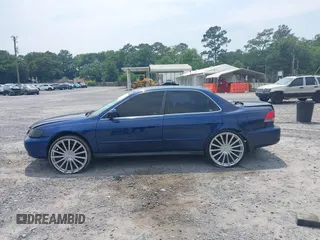 2002 Honda Accord LX z VIN 1HGCG56402A174052, wystawiony jako IAAI lot #42400300 z przebiegiem 223 902 mil mil oraz . Historia ofert i sprzedaży dostępna na DreamBid. Obrazek 14.