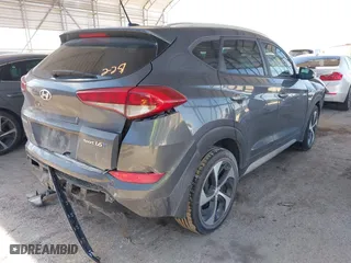 2017 Hyundai Tucson Value with VIN KM8J33A23HU472898, listed as a IAAI auction lot 41634205 with 81,690 mi miles. Bid and sale history available at carsss.com. Image 4.
