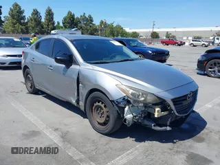2015 Mazda 3 i SV z VIN JM1BM1T76F1218894, wystawiony jako IAAI lot #42486358 z przebiegiem 255 629 mil mil oraz . Historia ofert i sprzedaży dostępna na DreamBid. Obrazek 1.