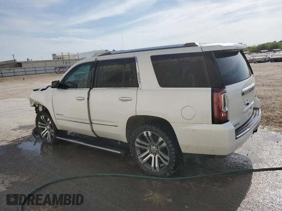 2017 GMC Yukon Denali with VIN 1GKS2CKJ3HR265680, listed as a Copart auction lot 53860035 with 200,749 mi miles and Salvage Title. Bid and sale history available at carsss.com. Image 2.