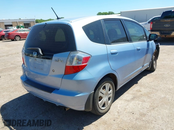 2009 Honda Fit z VIN JHMGE88209S011973, wystawiony jako IAAI lot #42300503 z przebiegiem 106 083 mil mil oraz . Historia ofert i sprzedaży dostępna na DreamBid. Obrazek 4.