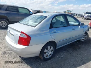 2004 Kia Spectra LX with VIN KNAFE122645052206, listed as a IAAI auction lot 41767864 with 63,866 mi miles. Bid and sale history available at carsss.com. Image 4.