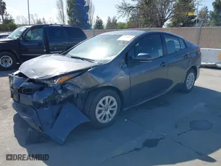 2022 Toyota Prius L Eco with VIN JTDKAMFU4N3177258, listed as a IAAI auction lot 39148811 with 50,902 mi miles. Bid and sale history available at carsss.com. Image 2.