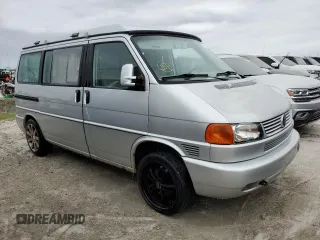 2003 Volkswagen EuroVan MV с VIN WV2NB47083H002700, выставлен на аукционе Copart как лот 76117874 с пробегом 186 942 миль миль и На запчасти • Non repairable. История ставок и продаж доступна на DreamBid. Изображение 4.