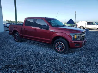 2018 Ford F-150 XL with VIN 1FTEW1CP0JFD02261, listed as a Copart auction lot 61850405 with 107,299 mi miles and Salvage title. Bid and sale history available at DreamBid. Image 4.