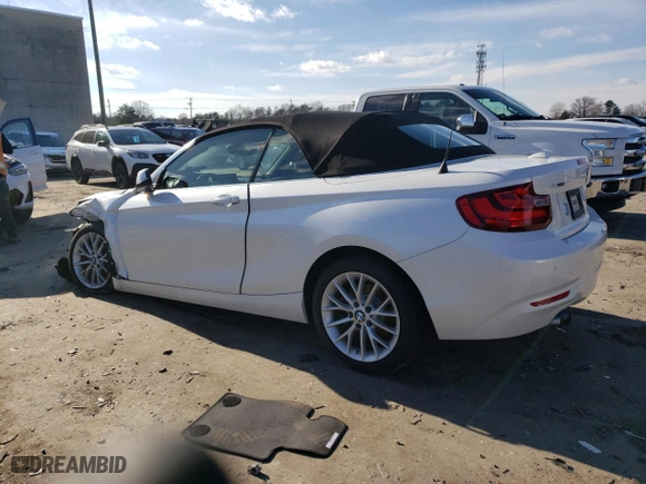 2015 BMW 2 Series 228i xDrive with VIN WBA1K7C57FV235082, listed as a Copart auction lot 87412554 with 75,061 mi miles and Salvage Title. Bid and sale history available at carsss.com. Image 2.
