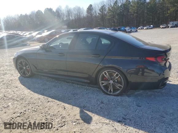 2023 BMW 5 Series M550i xDrive z VIN WBA13BK08PCM88687, wystawiony jako Copart lot #88633545 z przebiegiem Nie podano mil oraz Szkoda całkowita • Salvage title. Historia ofert i sprzedaży dostępna na DreamBid. Obrazek 2.