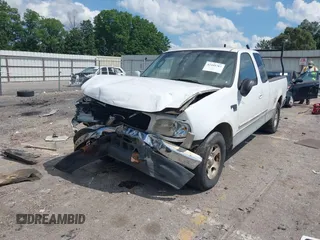 2002 Ford F-150 XL with VIN 1FTRX17W82NB98190, listed as a IAAI auction lot 42441761 with 276,107 mi miles and . Bid and sale history available at DreamBid. Image 2.