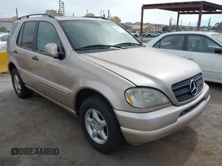 2001 Mercedes-Benz M 320/430/500 with VIN 4JGAB54E01A250833, listed as a IAAI auction lot 42797107 with 156,172 mi miles and . Bid and sale history available at DreamBid. Image 1.