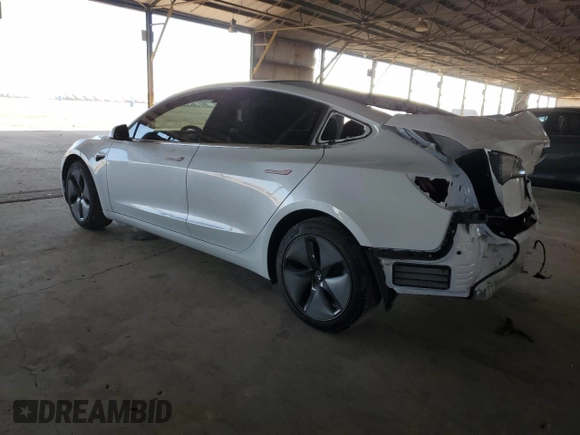 2019 Tesla Model 3 Mid Range with VIN 5YJ3E1EA0KF435613, listed as a Copart auction lot 86916314 with 25,663 mi miles and Salvage Title. Bid and sale history available at carsss.com. Image 2.