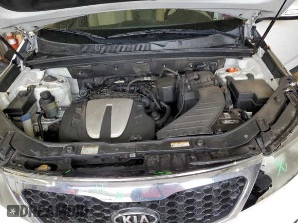 2011 Kia Sorento EX z VIN 5XYKU4A27BG136191, wystawiony jako Copart lot #52979995 z przebiegiem 209 280 mil mil oraz Szkoda całkowita • Salvage title. Historia ofert i sprzedaży dostępna na DreamBid. Obrazek 13.