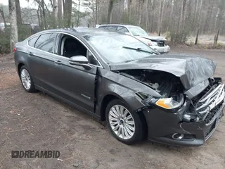 2016 Ford Fusion SE Hybrid z VIN 3FA6P0LU2GR388787, wystawiony jako IAAI lot #41733661 z przebiegiem 86 078 mil mil oraz . Historia ofert i sprzedaży dostępna na DreamBid. Obrazek 1.