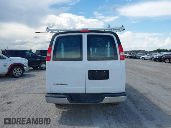 2021 Chevrolet Express Cargo with VIN 1GCWGAFP5M1258210, listed as a IAAI auction lot 42378121 with 50,438 mi miles and . Bid and sale history available at DreamBid. Image 16.