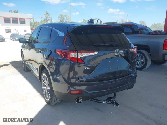 2021 Acura RDX w/Technology Package with VIN 5J8TC1H54ML016041, listed as a IAAI auction lot 41855161 with 33,876 mi miles. Bid and sale history available at carsss.com. Image 3.