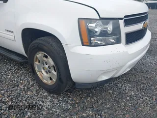 2012 Chevrolet Tahoe LT z VIN 1GNSCBE09CR131245, wystawiony jako IAAI lot #42350118 z przebiegiem 188 565 mil mil oraz . Historia ofert i sprzedaży dostępna na DreamBid. Obrazek 12.